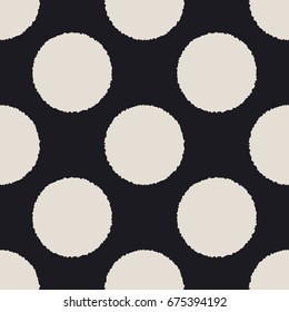 Stylish retro polka dots with rough edges seamless vector pattern. Decorative repeated background for print, textile, t-shirt, fabric, wallpaper, poster, home decor, packaging, wrapping, or web use.