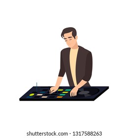 Stylish satisfied smiling disk jockey mixing tracks, holding hand on vinyl record and turntable needle on white background