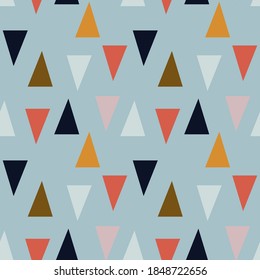 
Stylish seamless pattern. Multi-colored triangles on a gray-blue background. Geometric elements, vector background for baby textiles and baby design.