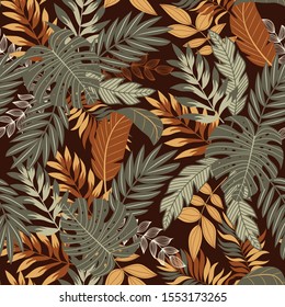 Stylish seamless pattern with tropical plants on a dark background. Trend vector design, beautiful print. Exotic wallpaper, Hawaiian style. Floral pattern. Jungle leaves.