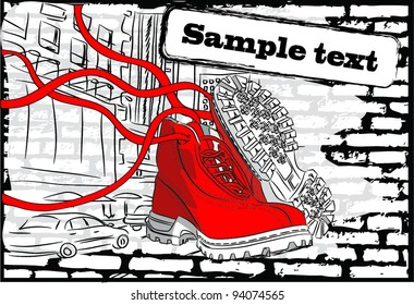 Stylish shoes at an abstract urban background
