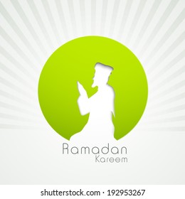 Stylish sticker, tag or label design with white silhouette of young muslim man praying on grey rays background for Ramada Kareem.