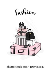 Stylish suitcase, boxes, shoes and bag. Clothes and accessories. Fashion & Style. Vector illustration for a postcard or a poster, print for clothes.
