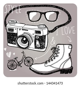 stylish sunglasses, boots, camera and bike
