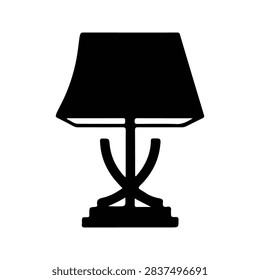 A stylish table lamp featuring a black shade and ornate base, perfect for enhancing living room or bedroom ambiance with warm lighting.