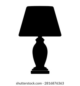A stylish table lamp featuring a traditional design, perfect for enhancing home interiors with warm lighting and aesthetic appeal.