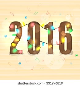 Stylish text 2016 covered by colorful lights for Happy New Year celebration.