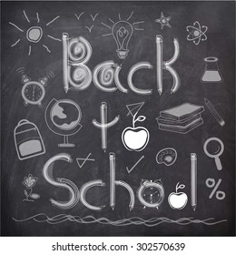 Stylish text Back to School with educational elements, objects and items created by white chalk on blackboard background.