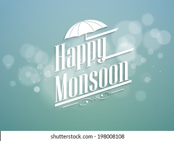 Stylish text Happy Monsoon and an open umbrella on shiny green background. 