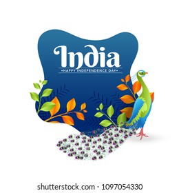 Texto elegante India con hojas de pavo real y color azafrán y verde sobre fondo azul. Concepto de celebración del Día de la Independencia de la India. 