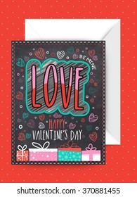 Stylish text Love decorated greeting card design with envelope for Happy Valentine's Day celebration.