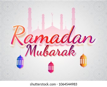 Stylish text Ramadan Mubarak with hanging colorful lanterns on mosque background. 