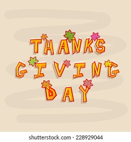 Stylish text Thanks Giving Day decorated with colorful maple leaves on beige background. 