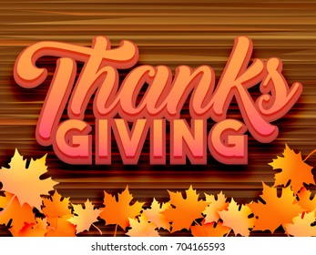 Stylish text Thanksgiving on wooden background with autumn leaves background. 