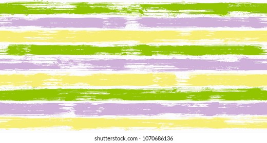 Stylish watercolor brush stripes seamless pattern. Unripe, purple and yellow paintbrush lines horizontal seamless texture for backdrop. Hand drown paint strokes graffiti artwork. For fabric.