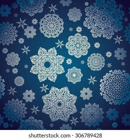 Stylish winter background, hand-drawn snowflakes, silver colored snowflakes