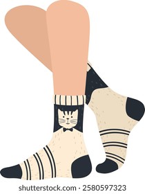 Stylish woman displaying trendy socks adorned with an adorable cat wearing a bow tie, infusing her outfit with a whimsical and playful flair