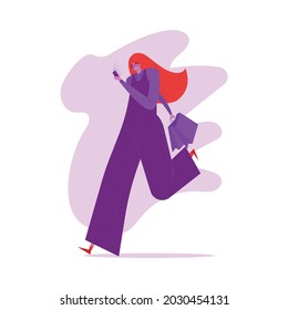 Stylish woman running and holding shopping bag while looking to her smart phone
