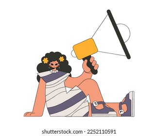 Stylish woman sits on the floor and holds a megaphone.