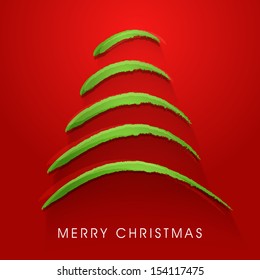Stylish Xmas tree on red background for Merry Christmas celebration. 