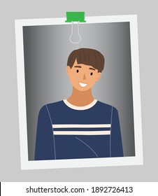 Stylish young dark-haired man on a gray background on a color photo with a binder. Cute teenager portrait in blue sweater. Handsome smiling young man, student or high school pupil flat vector