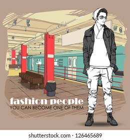 Stylish young guy at subway station.  Vector illustration