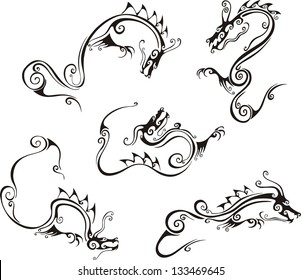 Stylistic dragon tattoos. Set of black and white vector illustrations.