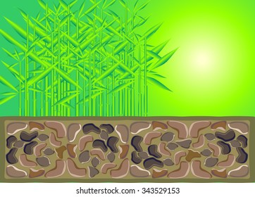 Stylized bamboo for cobblestone wall on background of hazy sun