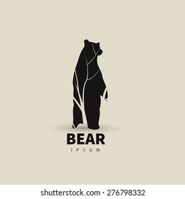 Stylized bear logo design template for your company. Artistic animal silhouette. Vector illustration.