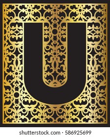 Stylized black letter U with gold ornament. Paper cut, wood cut.