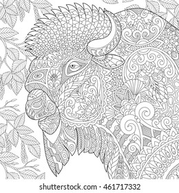 Stylized buffalo (american bison, bull, ox, yak, aurochs) among birch tree leaves. Freehand sketch for adult anti stress coloring book page with doodle and zentangle elements.