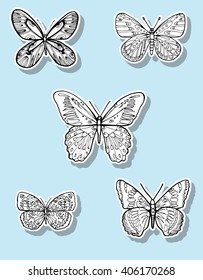 Stylized butterflies. Set butterflies. Decorative insects. Line art. Black and white drawing by hand. Dudling. Zentangl.