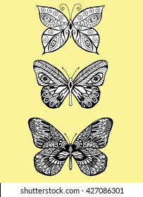 Stylized butterflies. Set butterflies. Decorative insects. Line art. Black and white drawing by hand. Dudling. Zentangl.