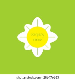 Stylized chamomile flower with space for text or company name in the middle of it isolated on bright green background. Logo template, design element