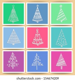 Stylized Christmas bauble cut  in blue paper with hand - drawn snowflakes and white bow, Christmas background