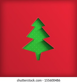 Stylized  Christmas tree cut  in red paper on green paper background with white dots, Christmas background