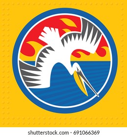 Stylized diving pelican insignia. Vector illustration.