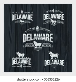 Stylized emblem of Delaware with a bull and the sailing ship the black