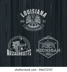 Stylized emblems of the states Louisiana, Michigan, Massachusetts black