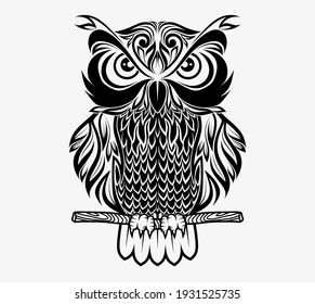 Stylized face of a owl  in the style of Zentangle.