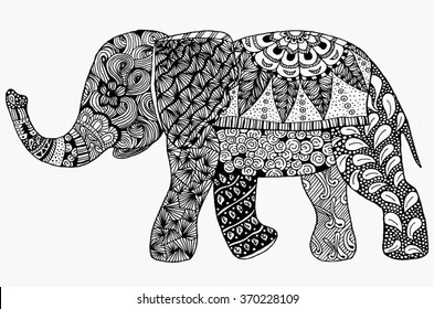 Stylized fantasy patterned elephant. Hand drawn vector illustration with traditional oriental floral elements.
