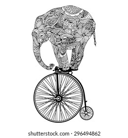 Stylized fantasy patterned elephant on vintage bicycle 