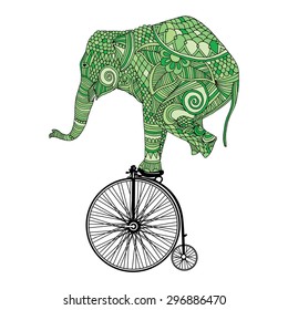 Stylized fantasy patterned elephant on vintage bicycle 