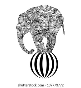 Stylized fantasy patterned elephant standing on a ball. Hand drawn vector illustration.