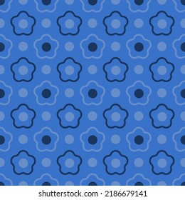 Stylized flower on a dark blue background. Vector seamless pattern.