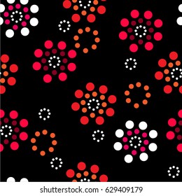 Stylized flowers made of circles on a black background. abstract seamless pattern