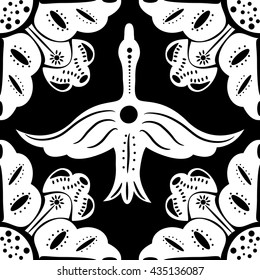 Stylized folk ornament with swan. Pattern with white elements on a black background. Template for tiles, mosaics, textiles, bed linen, carpet.
