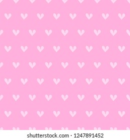 Stylized hand-drawn seamless pattern of small pink hearts. Saint Valentine's Day. Vector illustration on bright pink background.