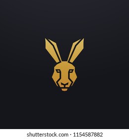 Stylized hare head icon illustration. Vector glyph, rabbit animal design with golden color