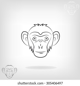 Stylized head of a monkey. 